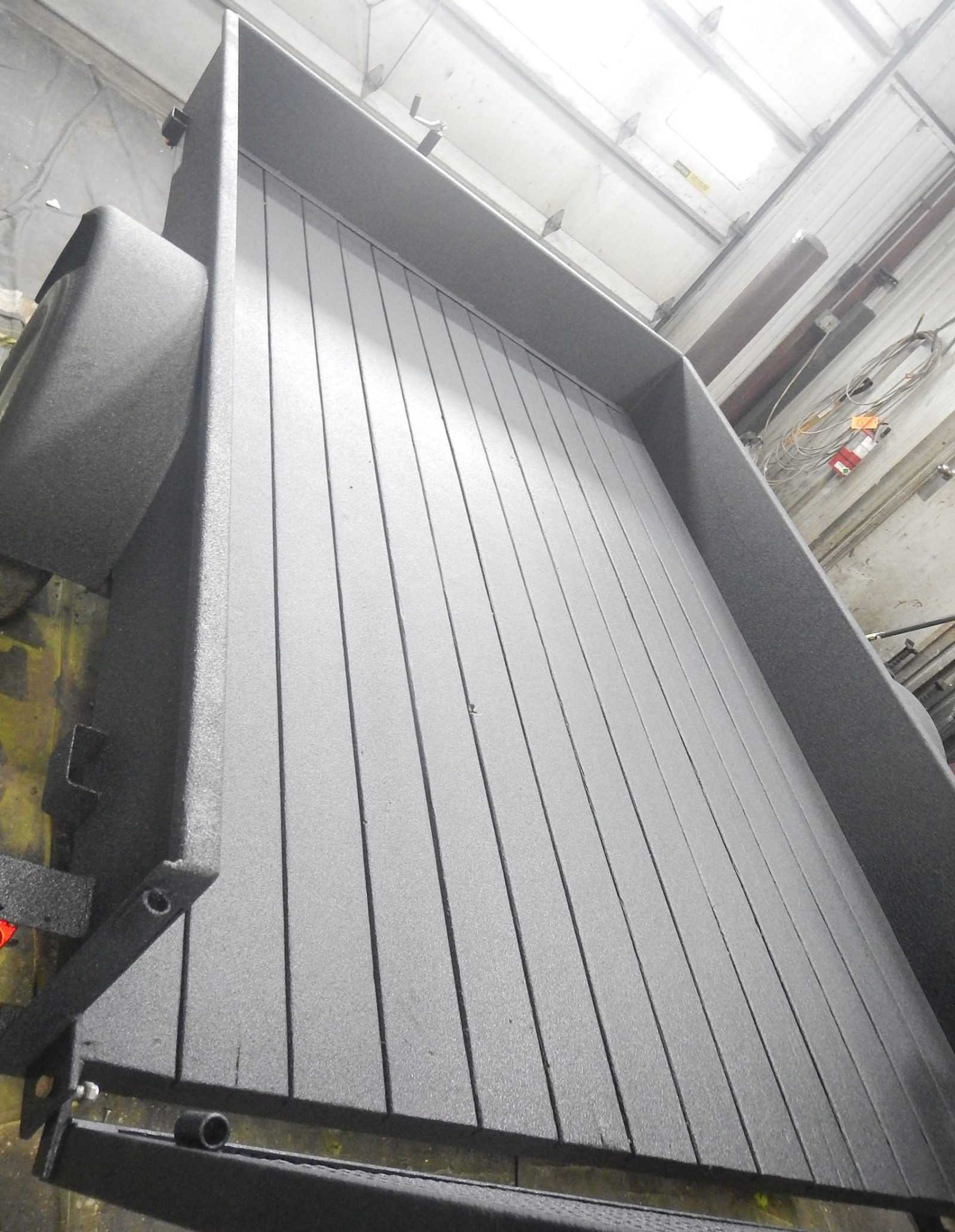 Truck underbody coated with rodent repellent gel